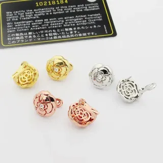 Chanel Camellia 金色花朵镂空金属耳环