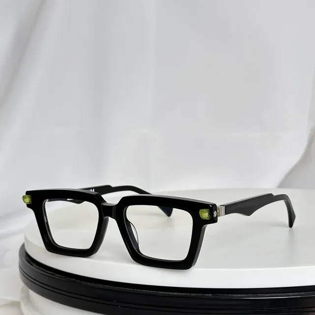 Lunettes optiques avec monture rectangulaire en acétate noire rouge accents bold sur les tempes 6