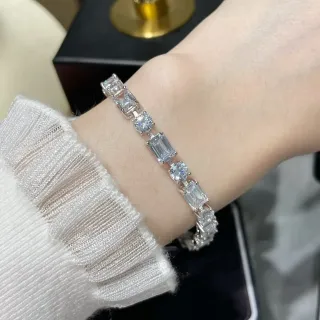 Bracelete com pedras transparentes alternando corte esmeralda e redonda