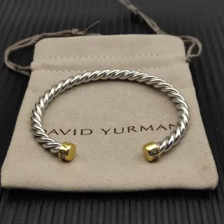 David Yurman Cable Classics سوار كم فضي وذهبي ملتوي