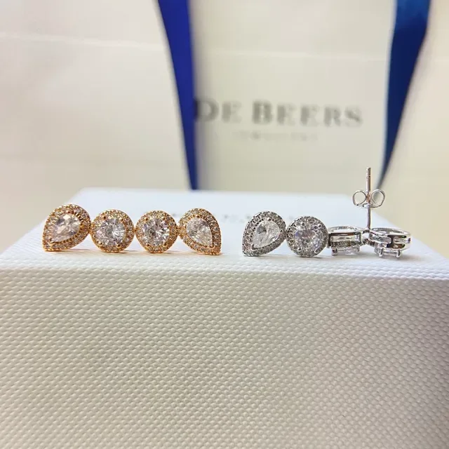De Beers Halo-Set Pear and Round Cut Stud Earrings 2