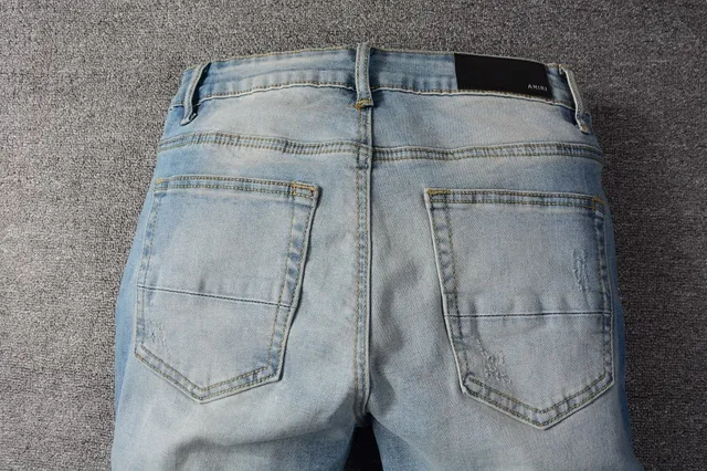 Distressed Slim-Fit Medium-Wash Blue Jeans 17