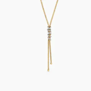 Collar de oro y diamantes con motivo twisted y borla caída