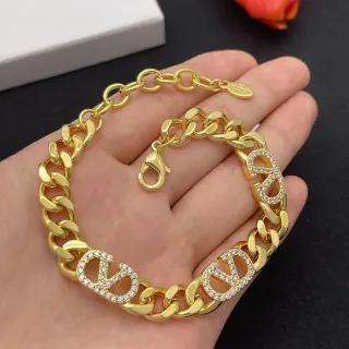 Pulsera cadena curb chunky Pavé-Crystal Logo Charms en oro y plata