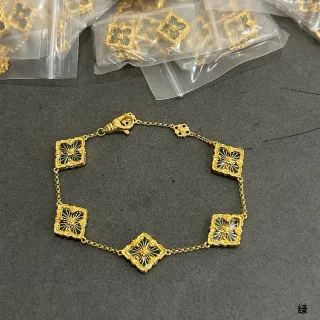 Pulsera de esmaltado floral cuatrifolio en tonos dorados