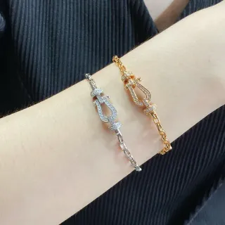 Pulseras de eslabones con cierre Pavé Lyre Clasp en tono plata y oro