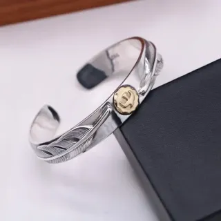 سوار كف فضي منحوت بريشة مزدوج اللون