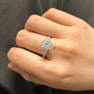 Three-Stone Oval and Pear-Cut Gemstone Ring