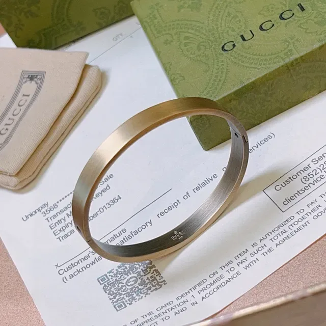 Gucci Brushed Gold-Tone Hinged Bangle Bracelet 9