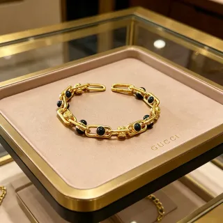 سوار Gucci ذهبي أسود سلاسل سميكة معدنية