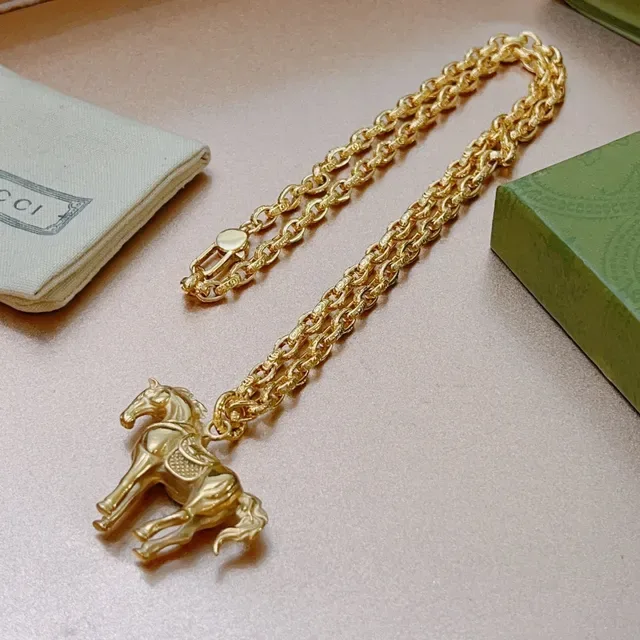 Gucci Gold-Tone Horse Pendant Necklace 9