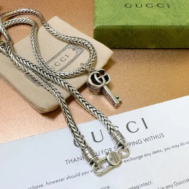 Collier Gucci pendentif clé chaîne tressée 5
