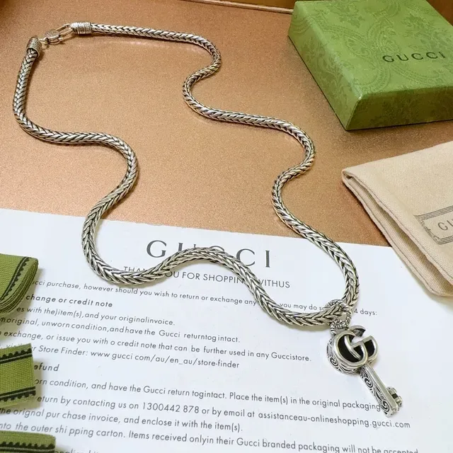 Collier Gucci pendentif clé chaîne tressée 6