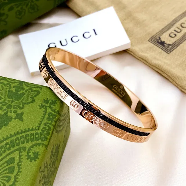 Gucci Logo Bangle Gold Black Metal-and-Textile Bracelet 3