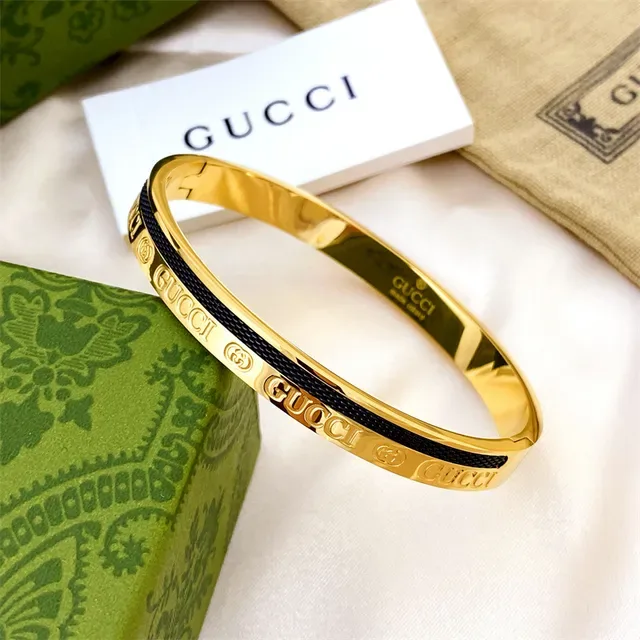 Gucci Logo Bangle Gold Black Metal-and-Textile Bracelet 4