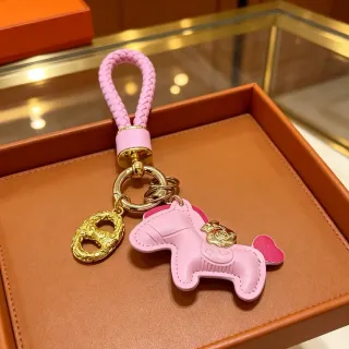 Hermès Pink Gold Leather Horse Charm Braided Strap Handbag