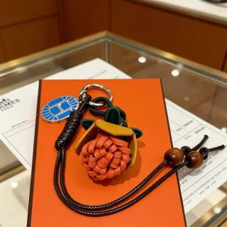 Hermès Rodeo Charm Naranja Negro Cuero Trenzado Flor Bolso Abierto Superior