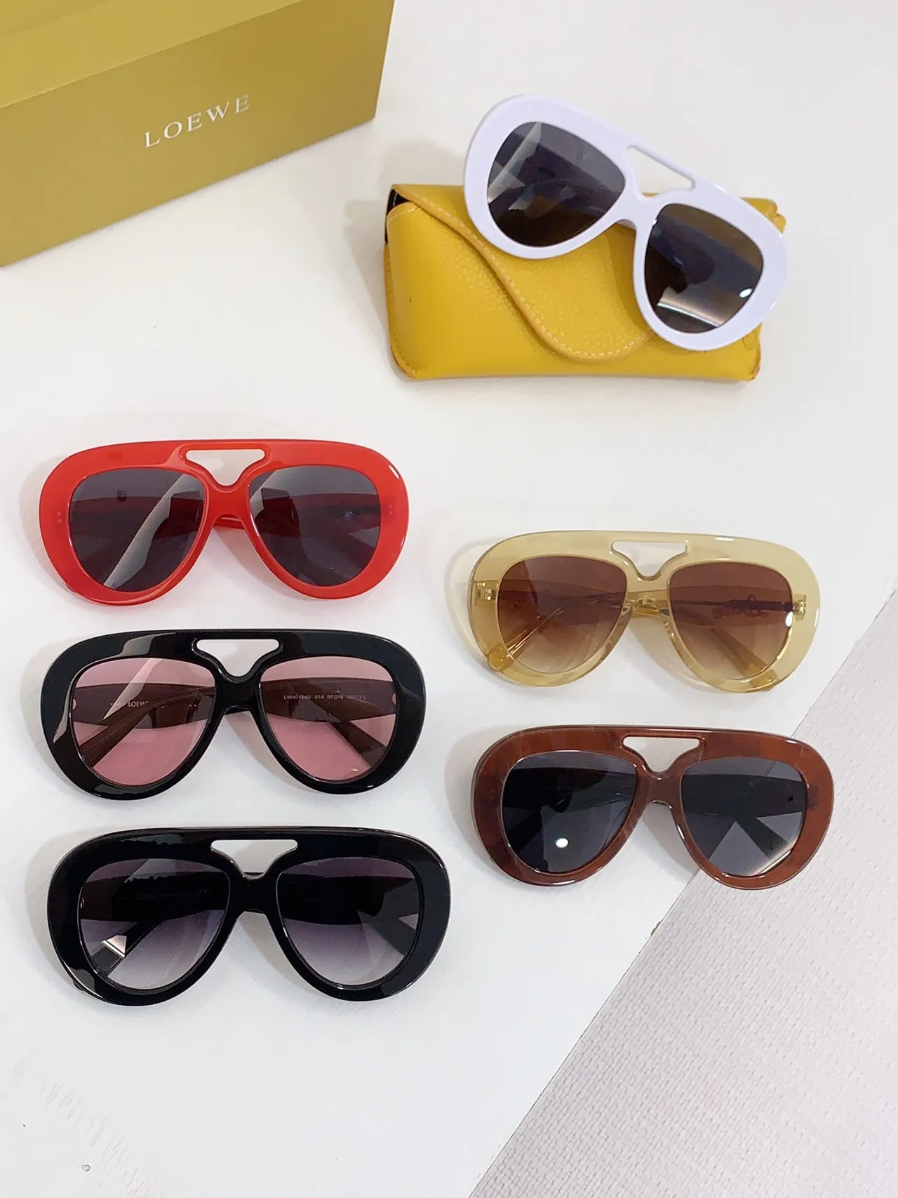 Loewe نظارات شمسية أسلوب أفياتور شفافة عنبر تدرج 4