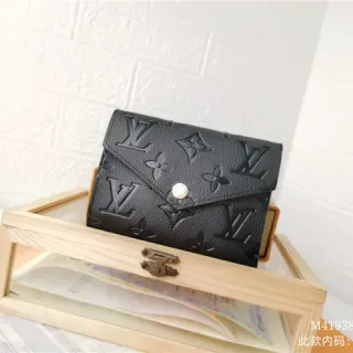 Louis Vuitton Black Embossed Monogram Leather Flap Closure Short Wallet