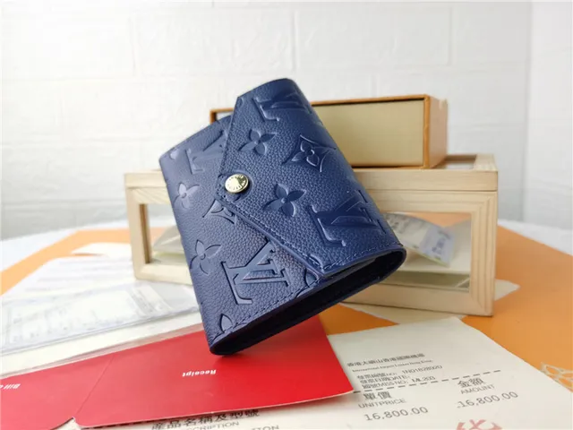 Louis Vuitton Black Embossed Monogram Leather Flap Closure Short Wallet 6