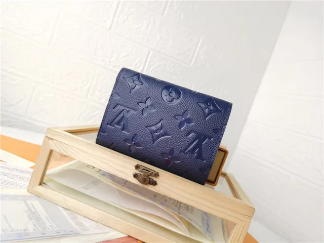 Louis Vuitton Black Embossed Monogram Leather Flap Closure Short Wallet 8