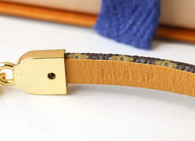 Louis Vuitton Brown Gold Monogram Canvas Strap Polished Double Heart Charm Bracelet 3