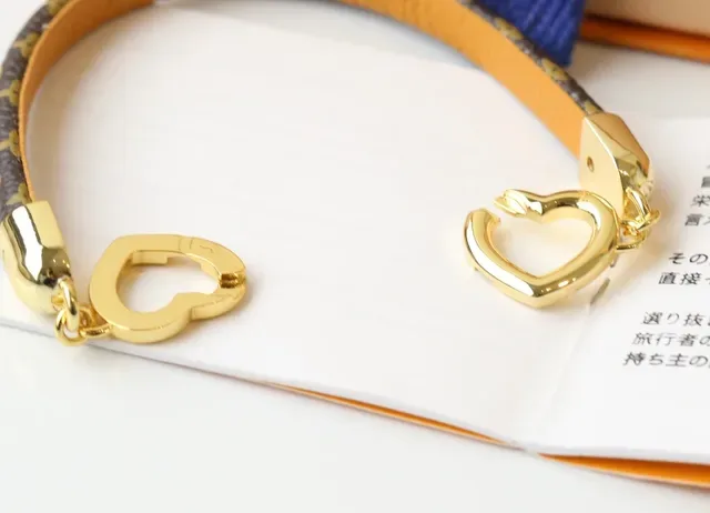 Louis Vuitton Brown Gold Monogram Canvas Strap Polished Double Heart Charm Bracelet 6
