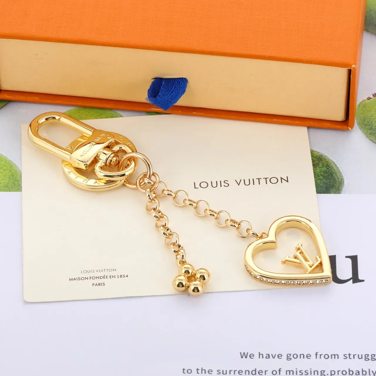 سوار قلادة Louis Vuitton CoEUR من المعدن الذهبي الأزرق على شكل قلب 9