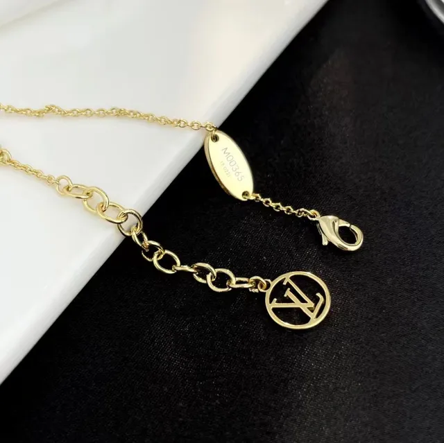 Louis Vuitton bracelet fleur chaîne ton or 2
