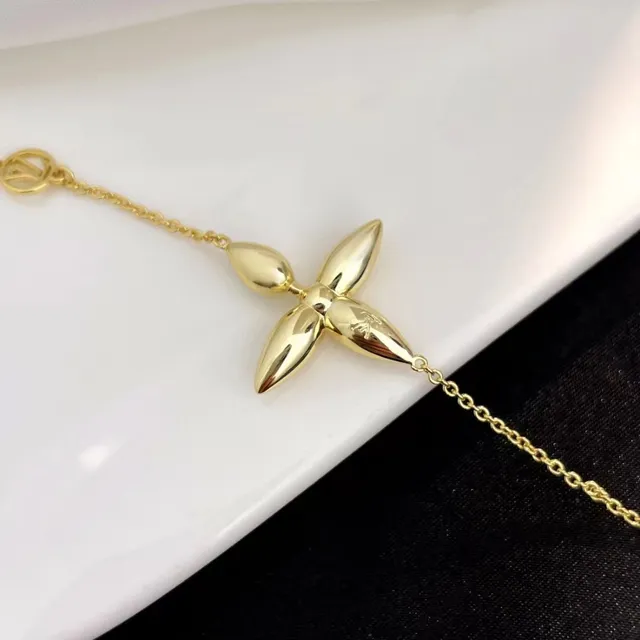 Louis Vuitton bracelet fleur chaîne ton or 3