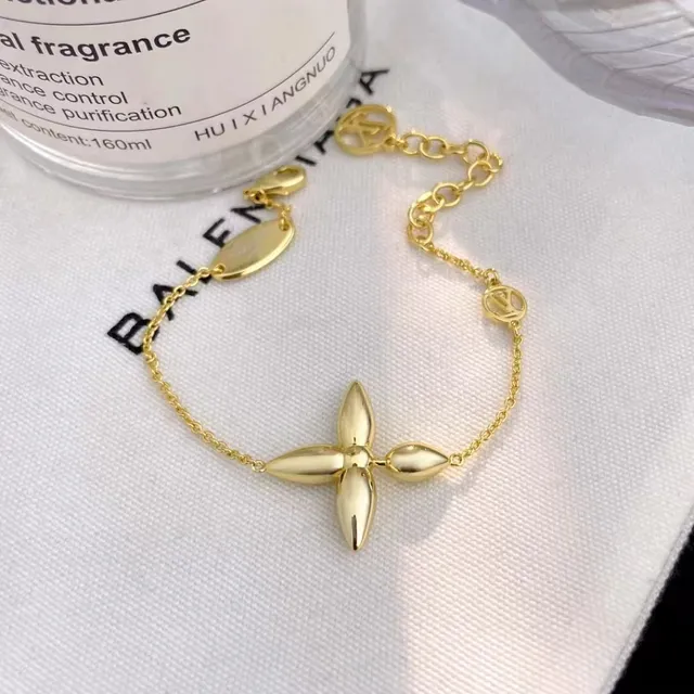 Louis Vuitton bracelet fleur chaîne ton or 4