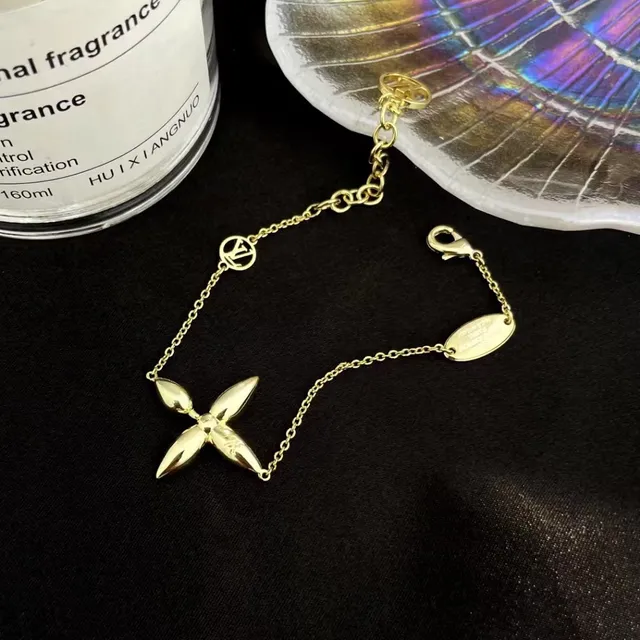 Louis Vuitton bracelet fleur chaîne ton or 7