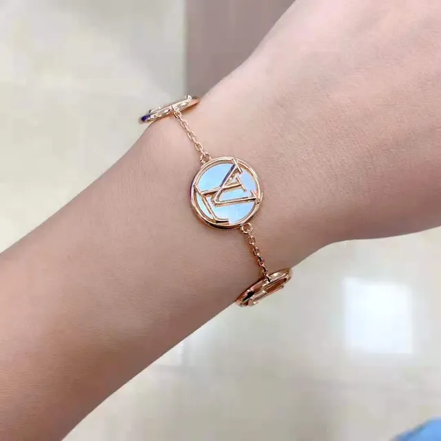 Louis Vuitton Gold Silver Chain-Link Circular Medallion Bracelet 9
