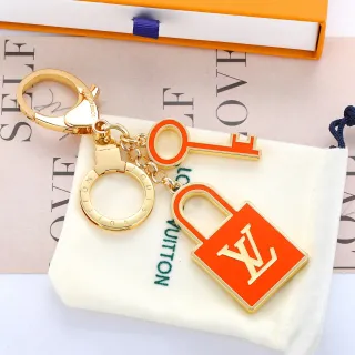 Louis Vuitton Lock & Key Naranja Oro Metal Esmaltado Pulsera