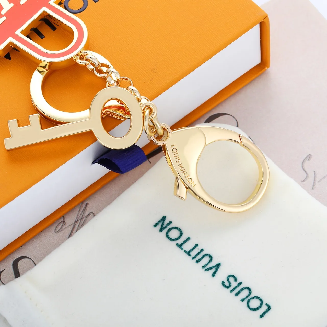 Louis Vuitton Lock & Key Orange Gold Metal Enamel Bracelet 7