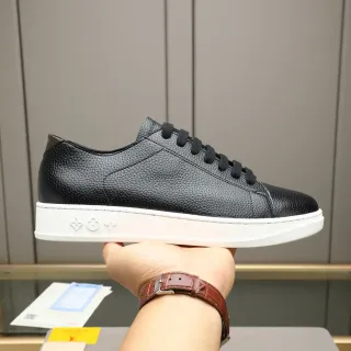 Louis Vuitton LV Trainer Black White Pebbled Leather Upper Embossed Monogram Sole Lifestyle Sneakers