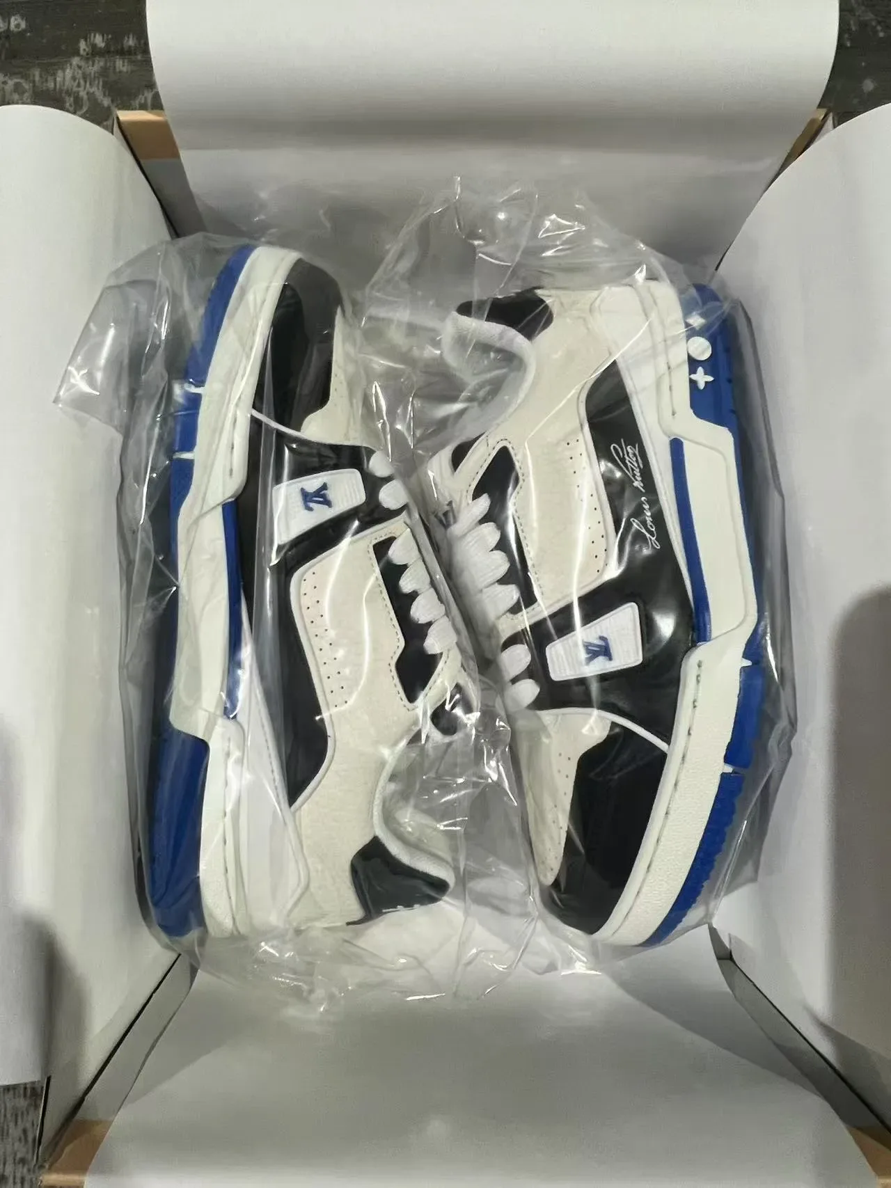 Louis Vuitton LV Trainer White Blue Layered Textured Leather Sculpted Midsole Lifestyle Sneakers 9