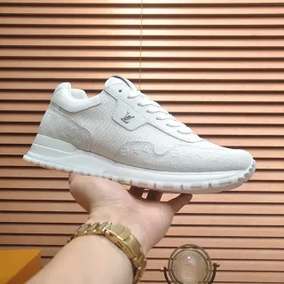 Louis Vuitton LV Trainer White Monogrammed Textile Upper Padded Collar Lifestyle Sneakers