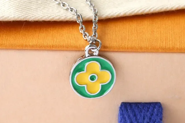 Louis Vuitton Monogram Flower and Fruit Charms Yellow Green Enamel Silver-Tone Chain Necklace 6