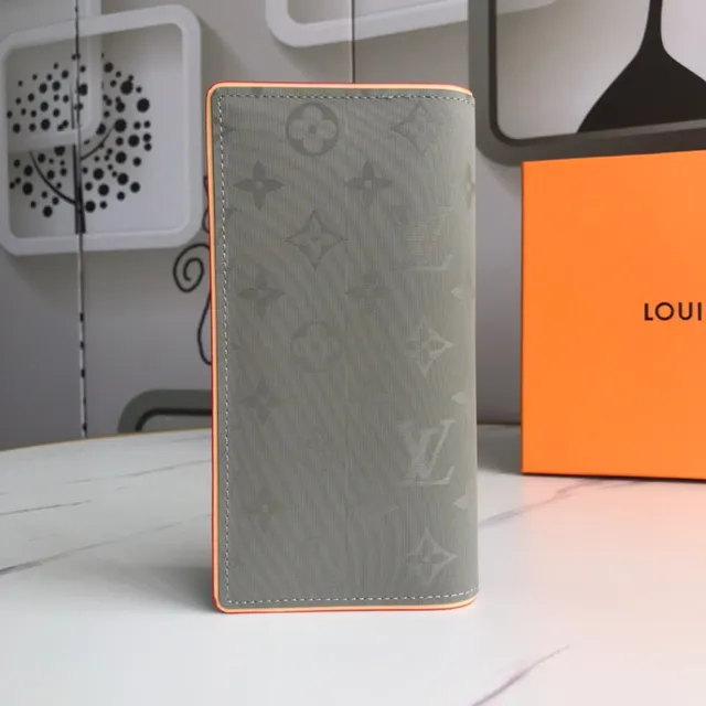 Louis Vuitton Monogram billetera larga gris y naranja 7