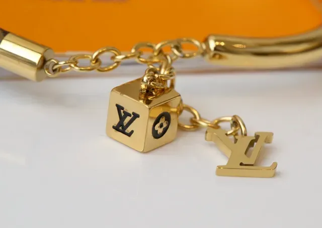 Louis Vuitton Monogram World Tour Brown and Gold Bracelet 4
