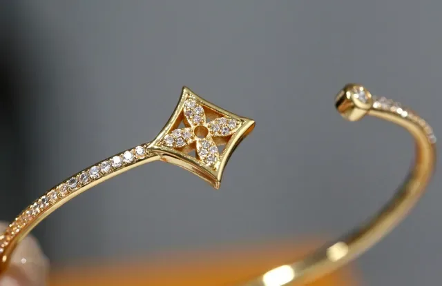 Louis Vuitton Quatrefoil Pavé Diamond Gold Tone Open Bangle Bracelet 8