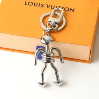 إكسوار جوال Louis Vuitton على شكل تمثال معدن مطلي أزرق فضي