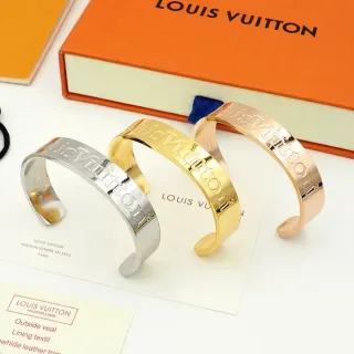Louis Vuitton Silver Gold Engraved Logo Rigid Cuff Bracelet