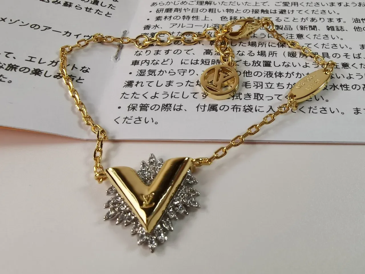 Louis Vuitton V Collection Gold Silver Chain Pendant Bracelet 7