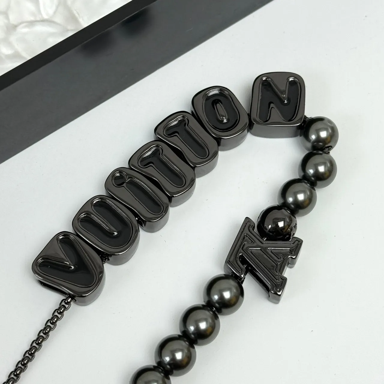 Louis Vuitton VUITTON Letter Bead and LV Monogram Black Metal Bracelets 9