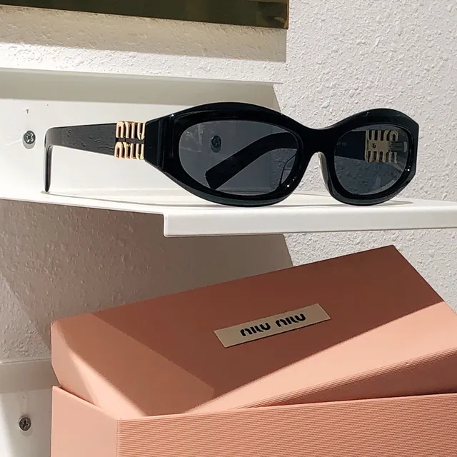 Miu Miu Orange Black Oval Acetate Frame Embossed Logo Temples Sunglasses 5