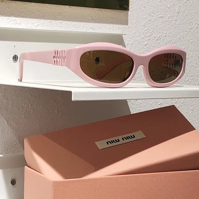 Miu Miu Orange Black Oval Acetate Frame Embossed Logo Temples Sunglasses 6