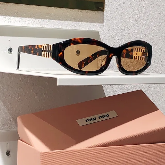 Miu Miu Orange Black Oval Acetate Frame Embossed Logo Temples Sunglasses 7