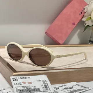 Miu Miu SMU04Z Cream Oval Acetate Sunglasses